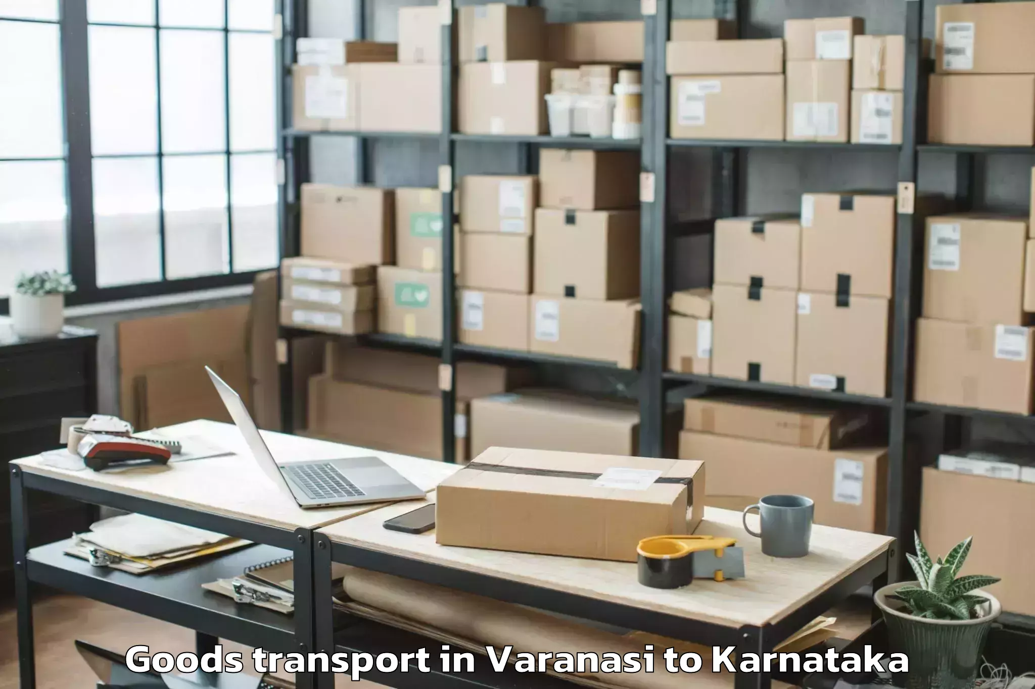 Reliable Varanasi to Karnataka State Law University Goods Transport